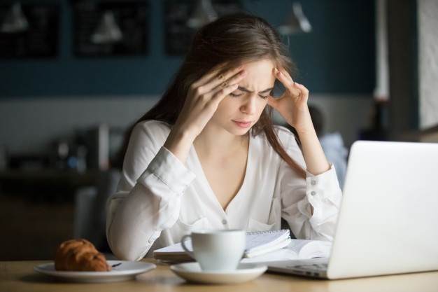 nervous stressed female student feeling headache studying cafe 1163 5168