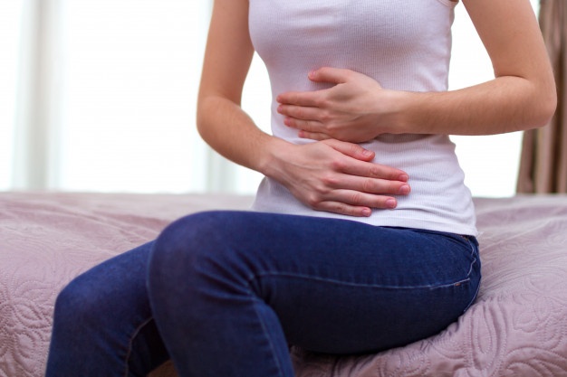 young woman feels abdominal pain during period menstruation 122732 424 2