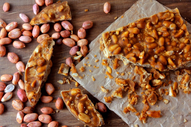 pa c de moleque is typical sweet brazilian cuisine made with roasted peanuts rapadura it is called chikki india nougat portugal palanqueta mexico 59529 817 1