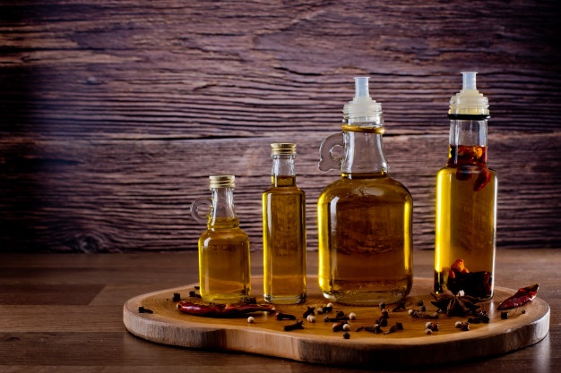 bottles with olive oil with spices wooden 149301 281 1