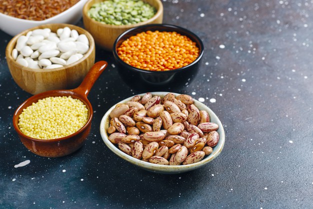 legumes beans assortment different bowls light stone background top view healthy vegan protein food 114579 14321 1