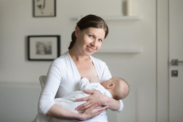 portrait young smiling attractive woman breastfeeding chi 1163 2130