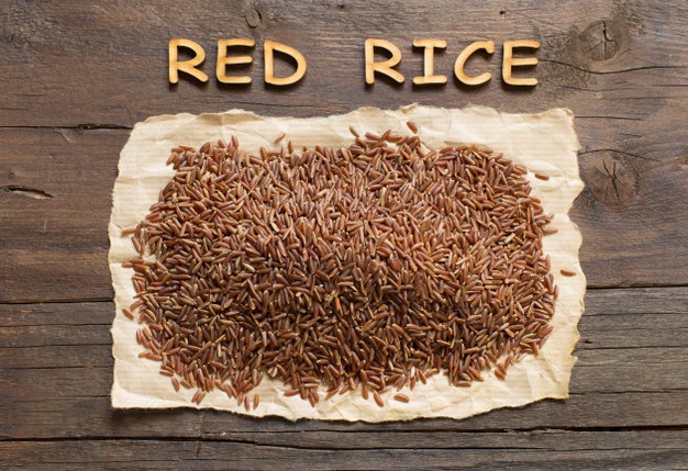 red rice wooden table with wooden letters top view 202769 2053
