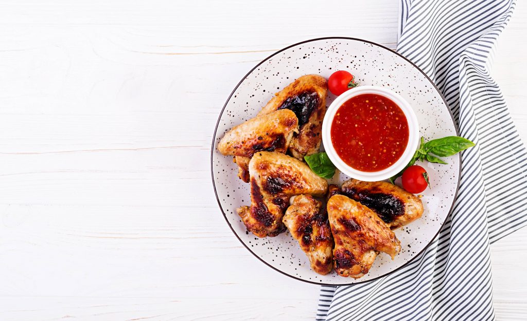 baked chicken wings asian style tomatoes sauce plate 1