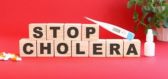words stop cholera is made wooden cubes red background with medical drugs 284815 873